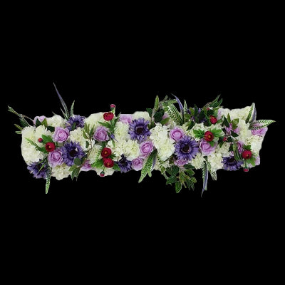 Floral arrangement with purple, white, and red flowers on a white background