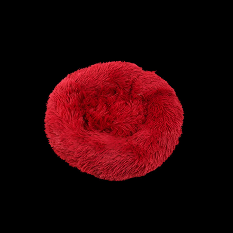 Red fluffy ball on a white background with a brand logo in the corner.