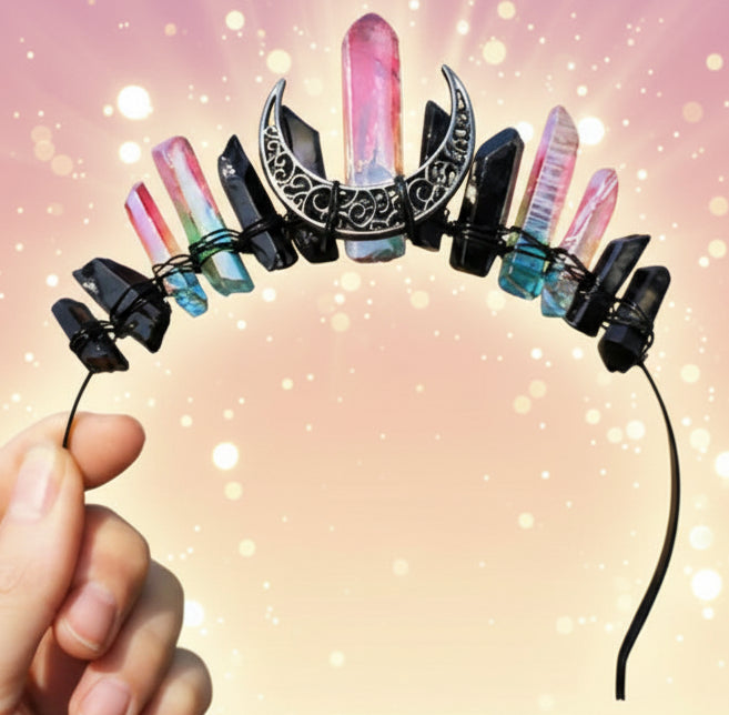 Decorative headband with crystals held by a hand against a natural background