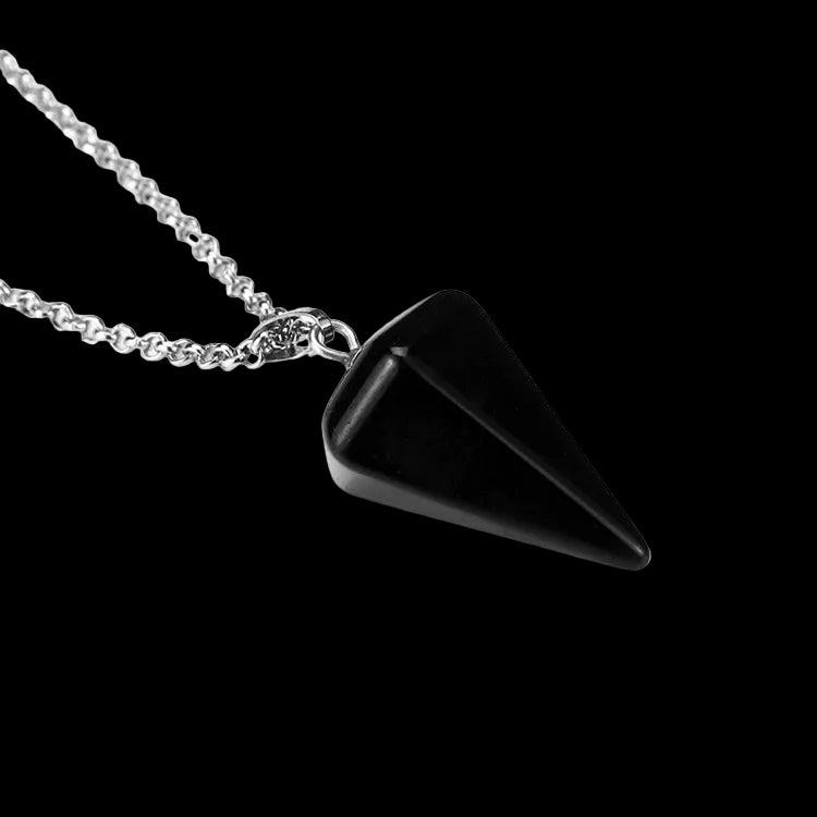 Black pyramid-shaped pendant on a silver chain against a white background