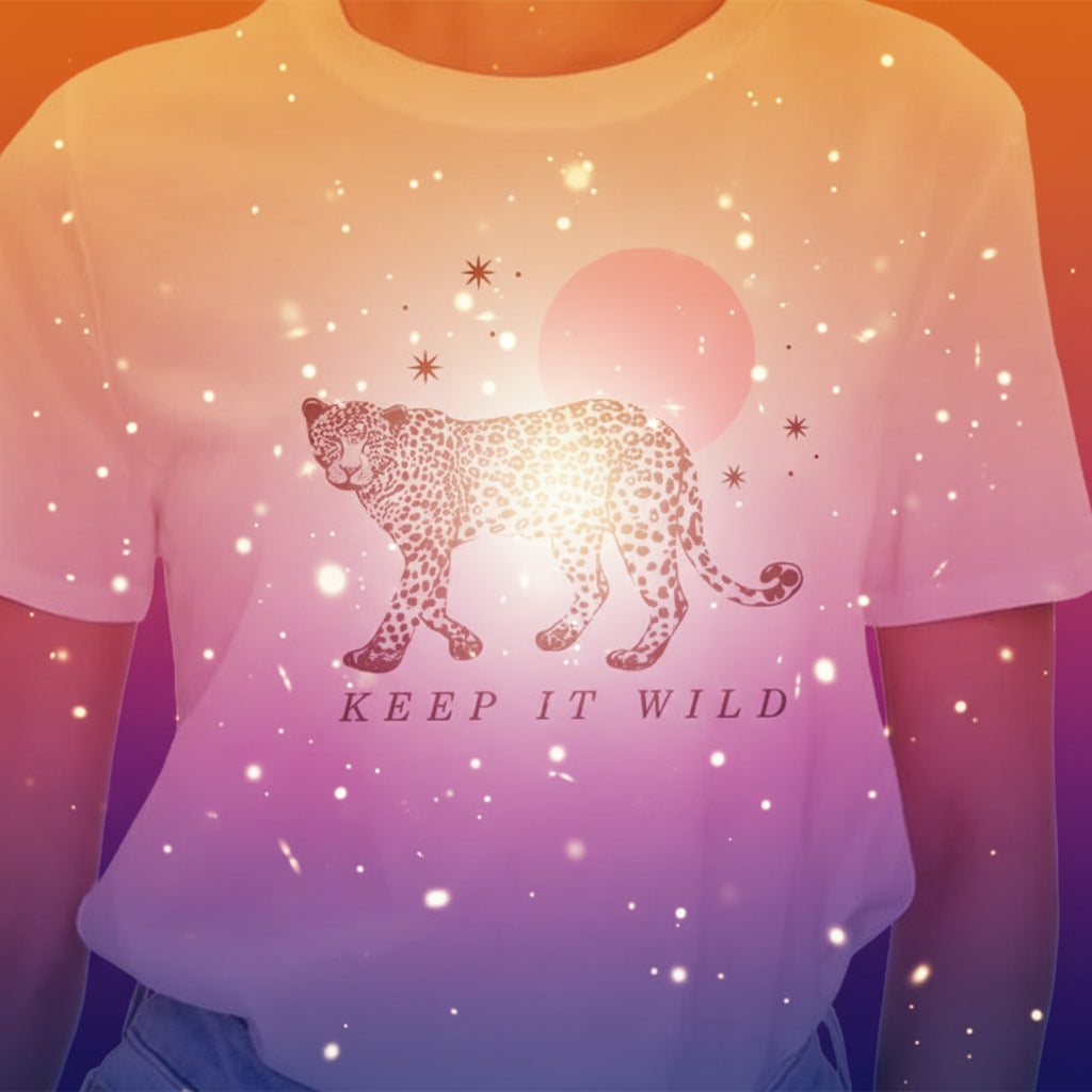White t-shirt with a leopard graphic and 'Keep It Wild' text on a plain background