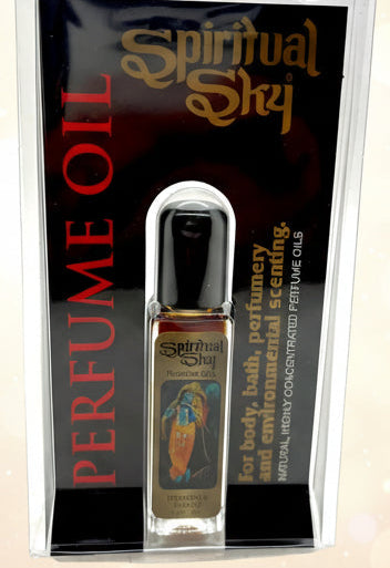 Packaged perfume oil with 'Spiritual Sky' branding on a white background