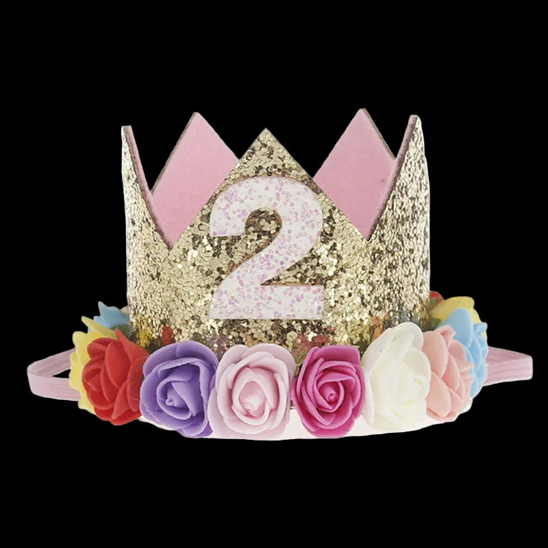 Gold tiara with number '2' and colorful flowers on a white background