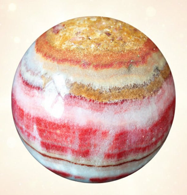 Marble-like sphere with red and white stripes on a black background