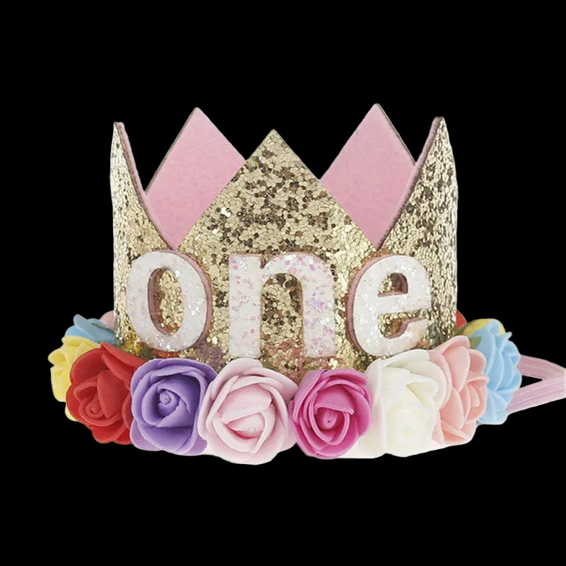 Gold glitter 'one' tiara with colorful flowers on a white background