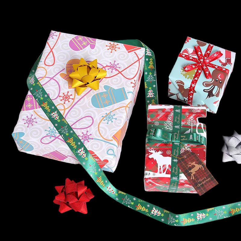 Colorful gift boxes with festive wrapping paper and ribbons on a white background