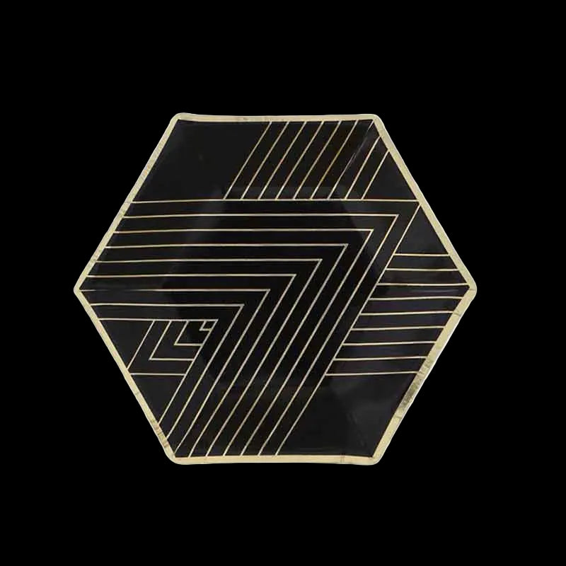 Hexagonal black plate with gold geometric patterns on a white background