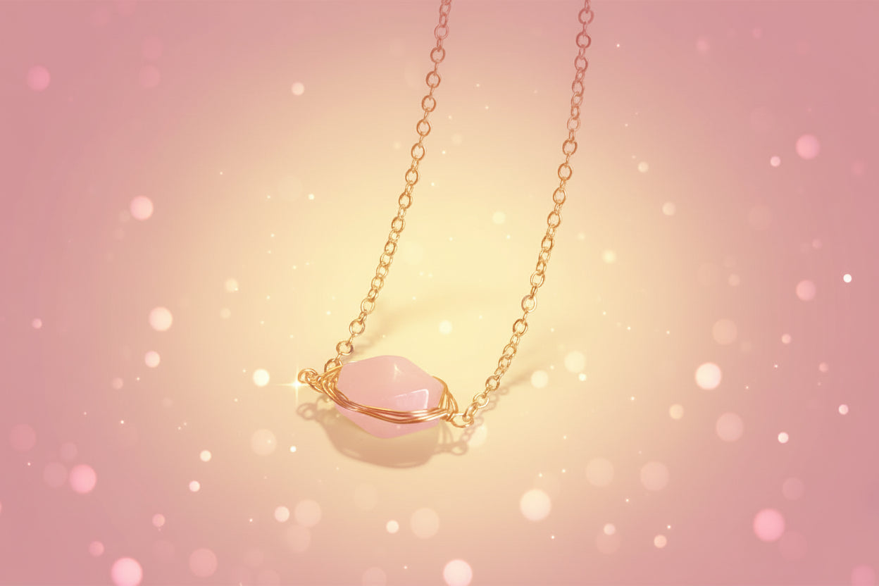 Necklace with a pink pendant on a beige and white background