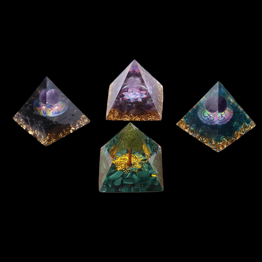 Four pyramid-shaped decorative items on a wooden base with a white background