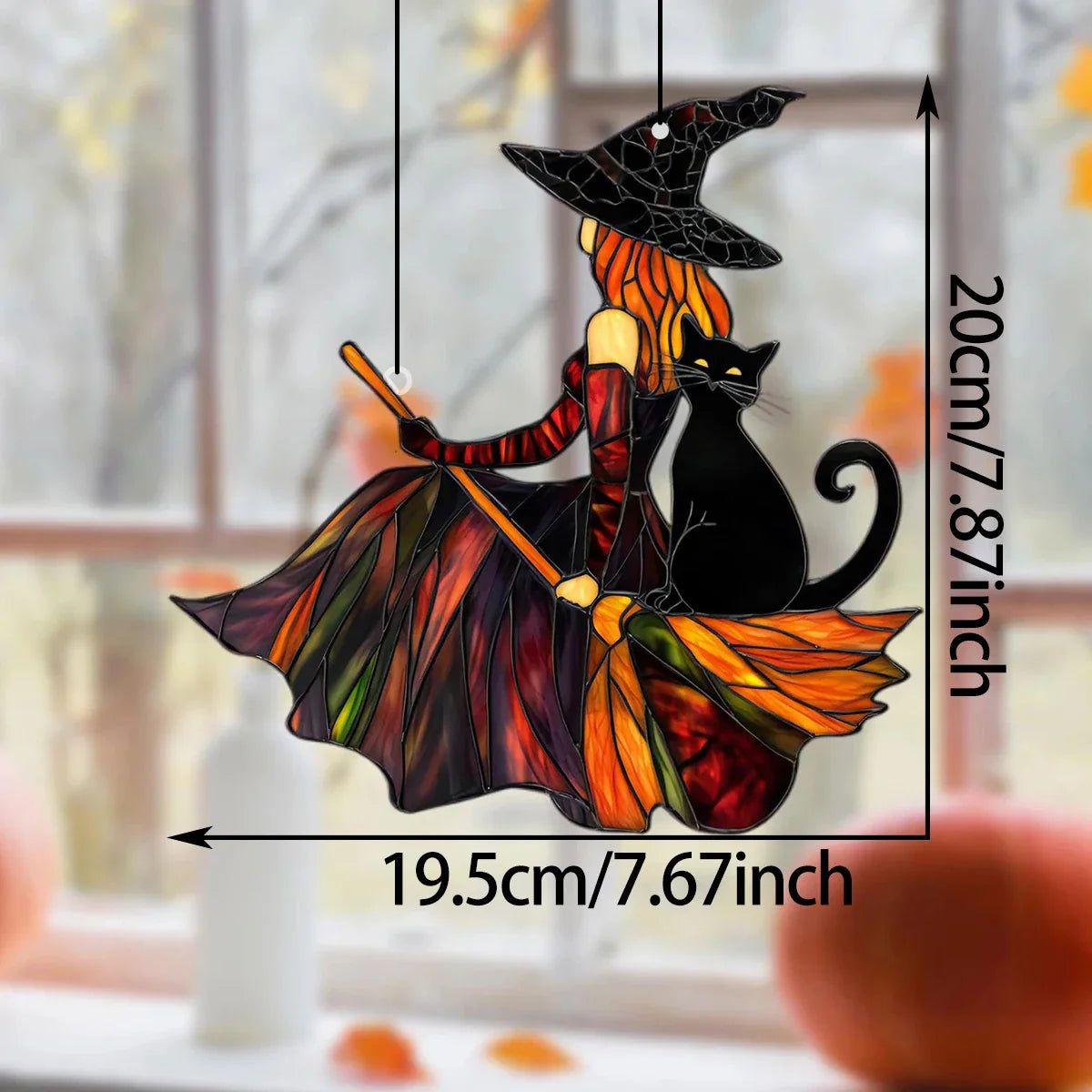 Decorative Halloween-themed stained glass panel with a witch and black cat on a broomstick, shown with dimensions.