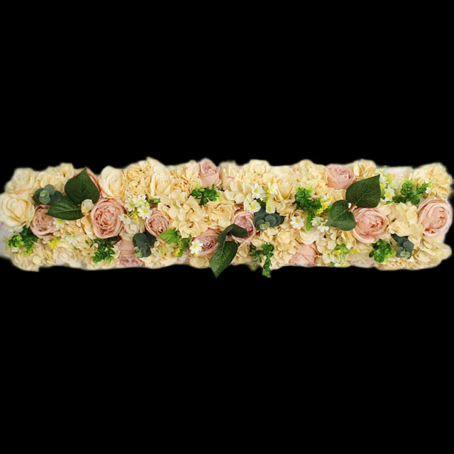 Floral arrangement with pink roses, yellow flowers, and green leaves on a white background