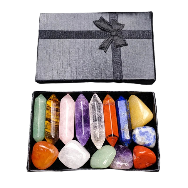 Box of colorful crystals with a black ribbon on a dark background