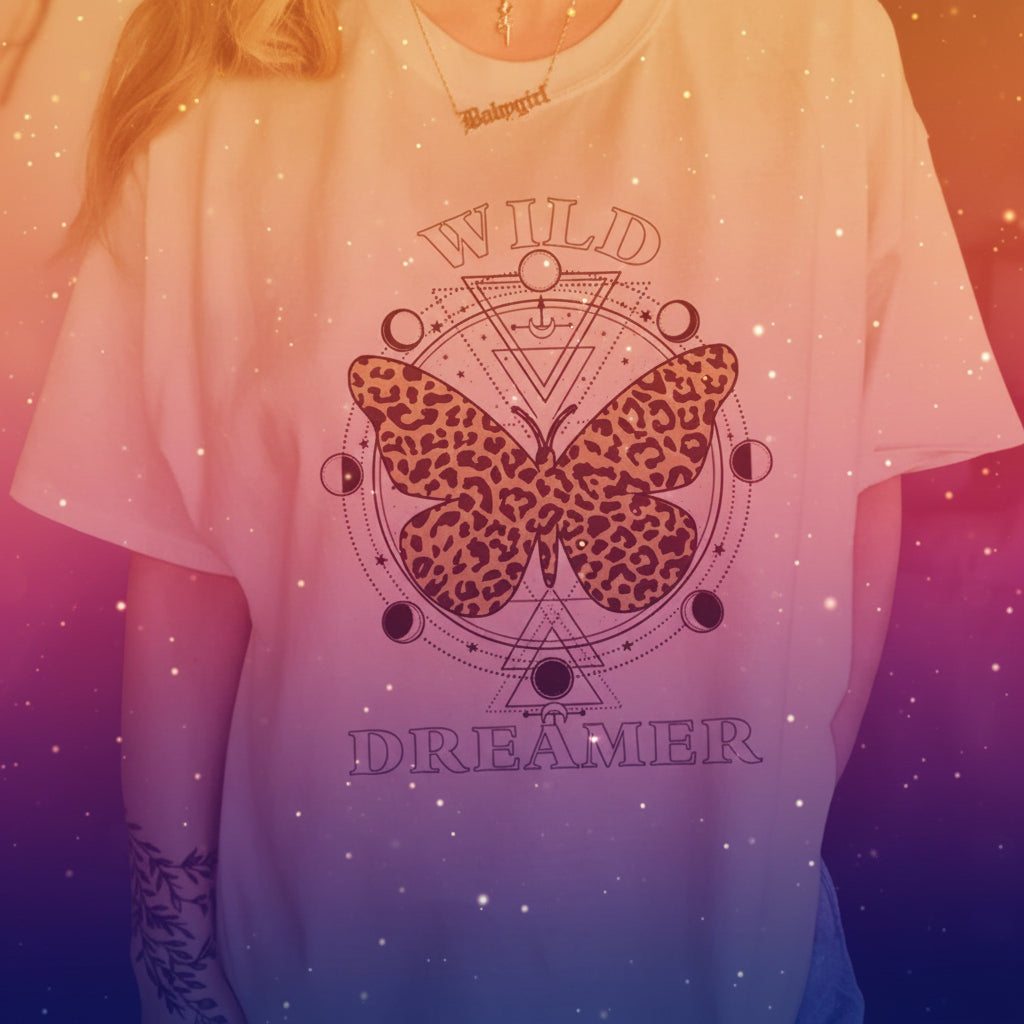 Beige t-shirt with leopard print butterfly design and 'Wild Dreamer' text.