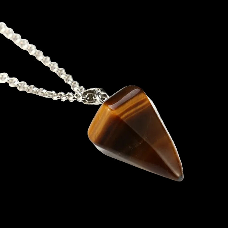 Tiger's eye pendant on a silver chain against a white background