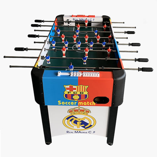 Foosball table with Real Madrid and Barcelona logos on a white background