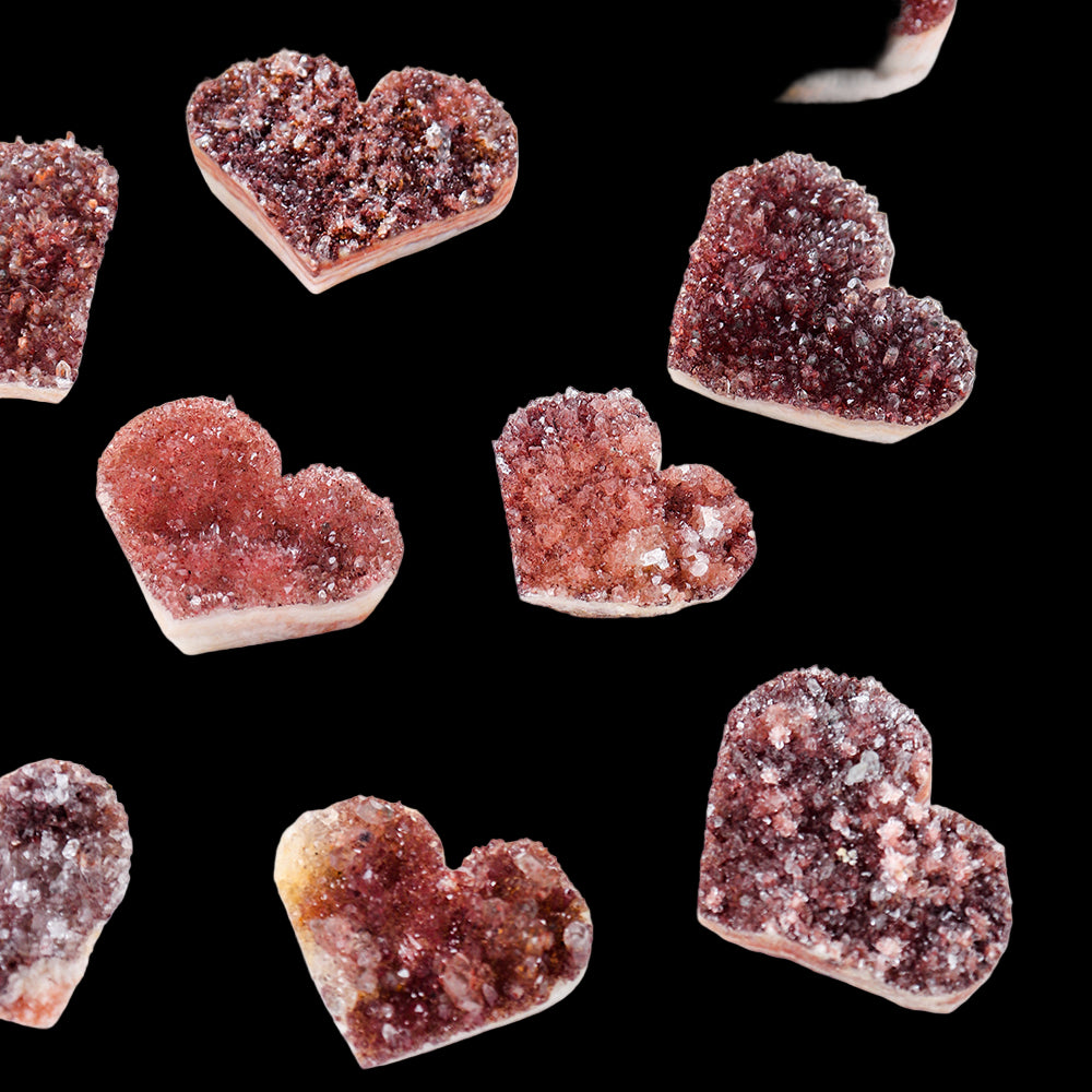 Heart-shaped geode crystals on a white background