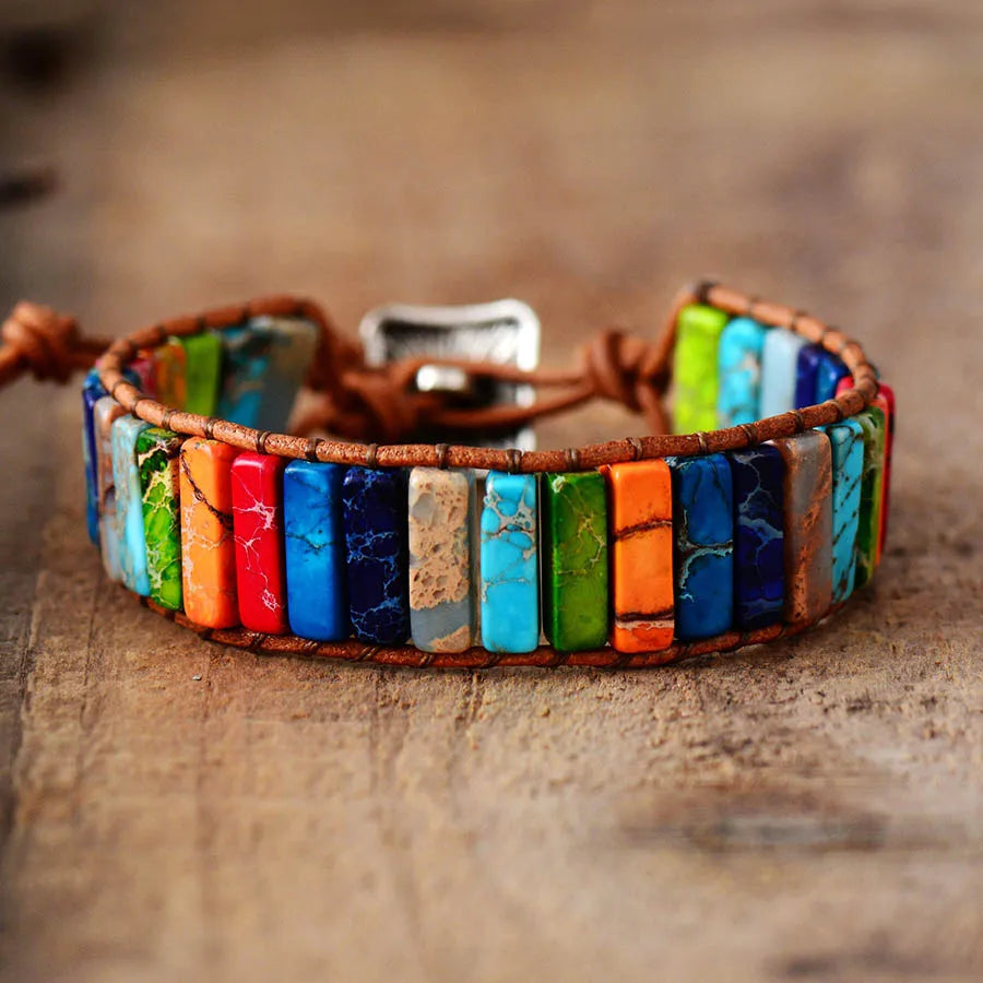 Colorful beaded bracelet on a wooden surface