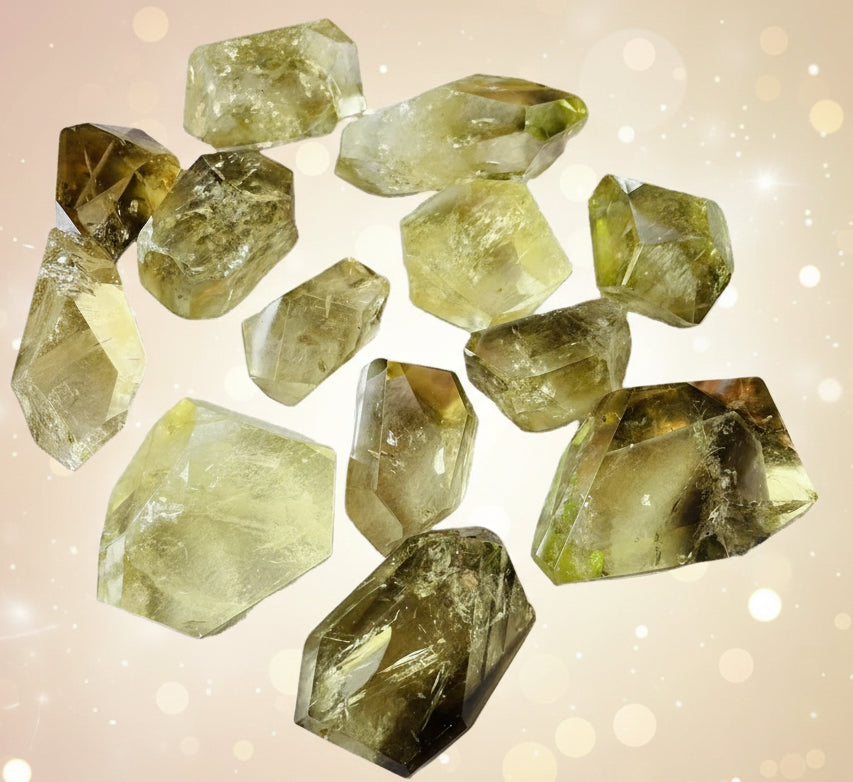 Collection of yellow crystal rocks on a white background