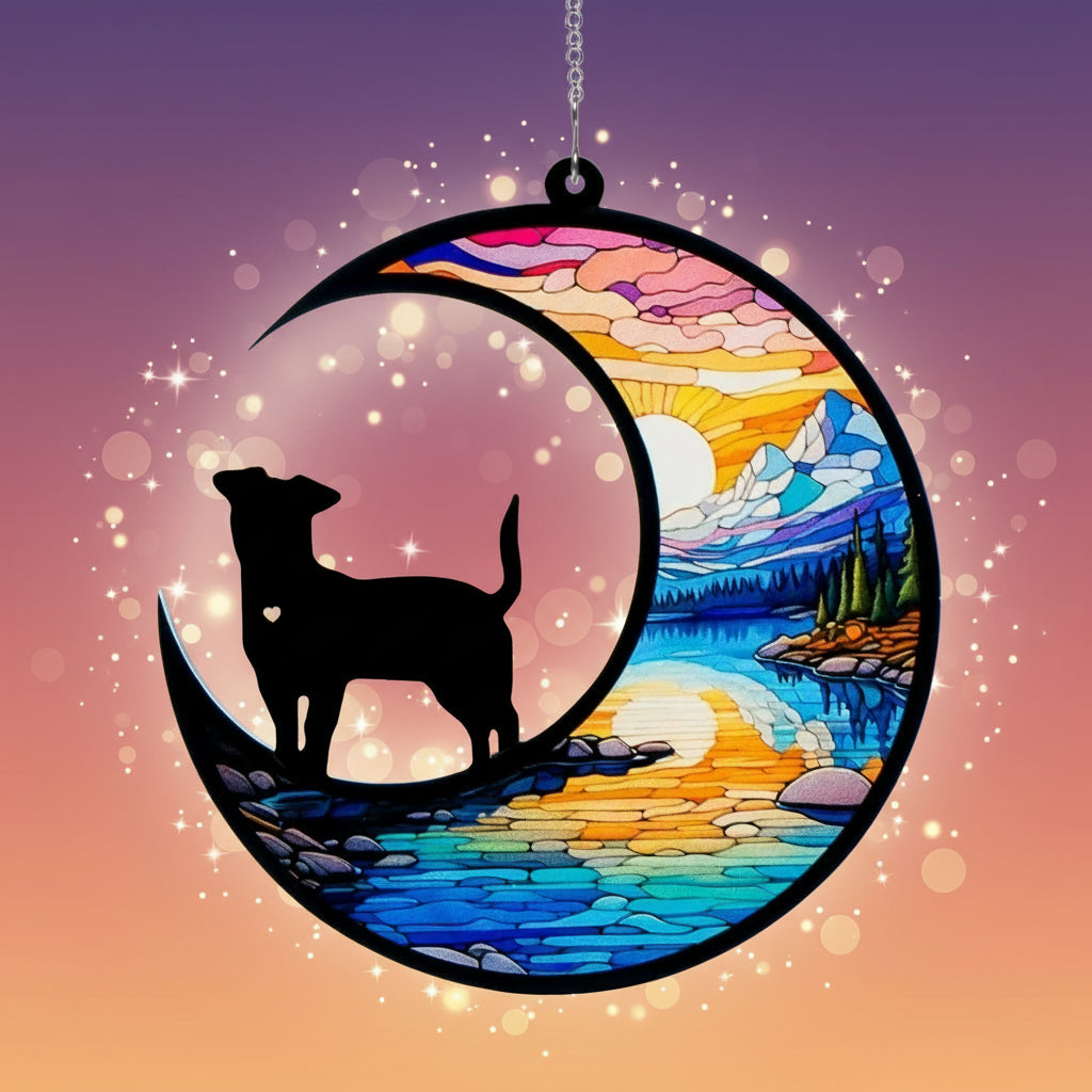 Decorative hanging with a silhouette of a dog on a crescent moon, set against a colorful landscape.