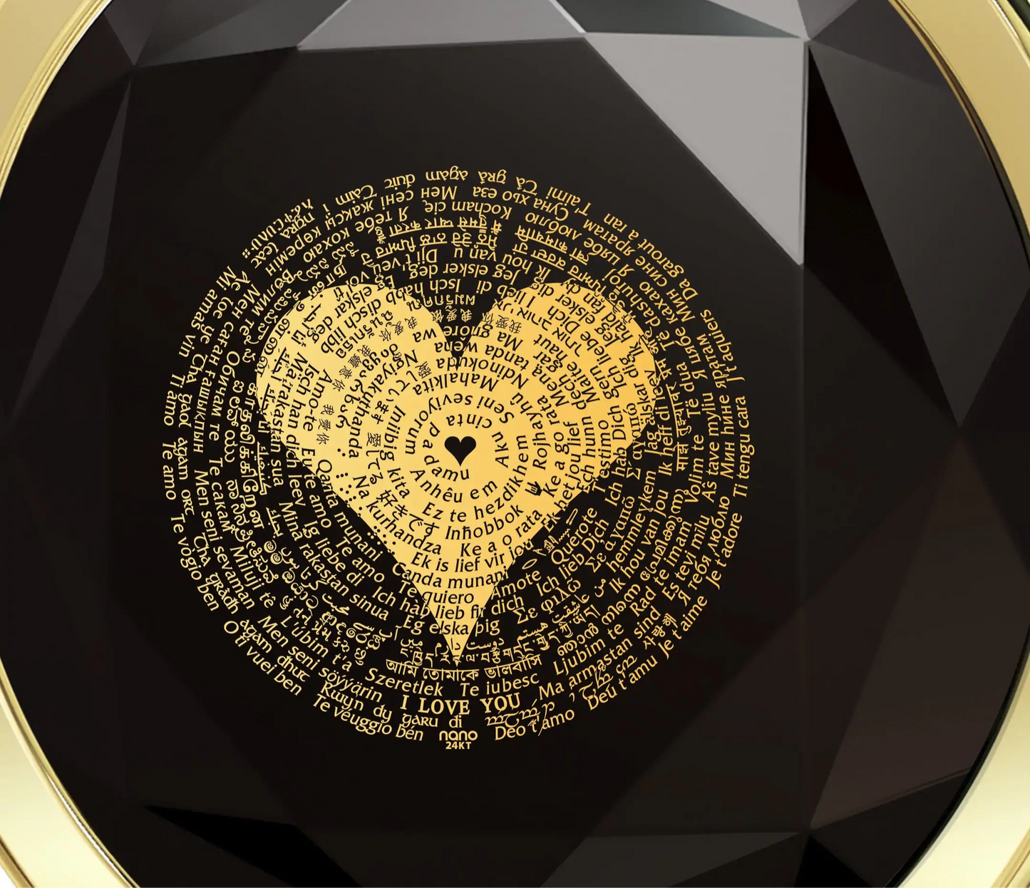 Gold heart design with 'I love you' on a black gemstone background