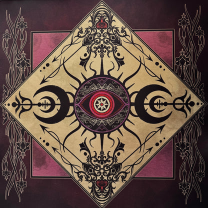 A square decorative artwork featuring a large diamond-shaped central motif with ornate black filigree, a stylized eye with a star inside, and pink panels on a dark burgundy background.
