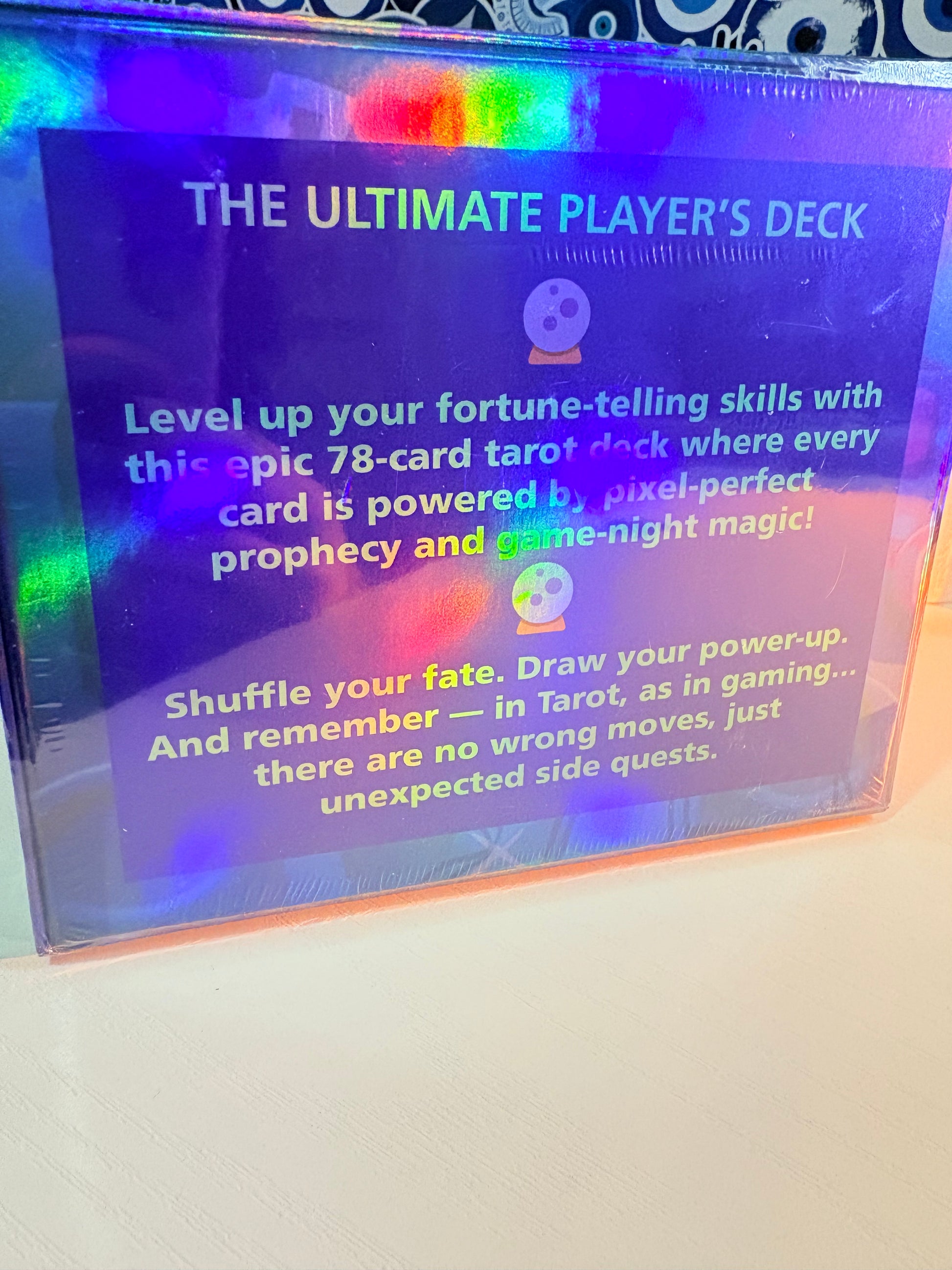 Card game packaging with colorful text on a white background