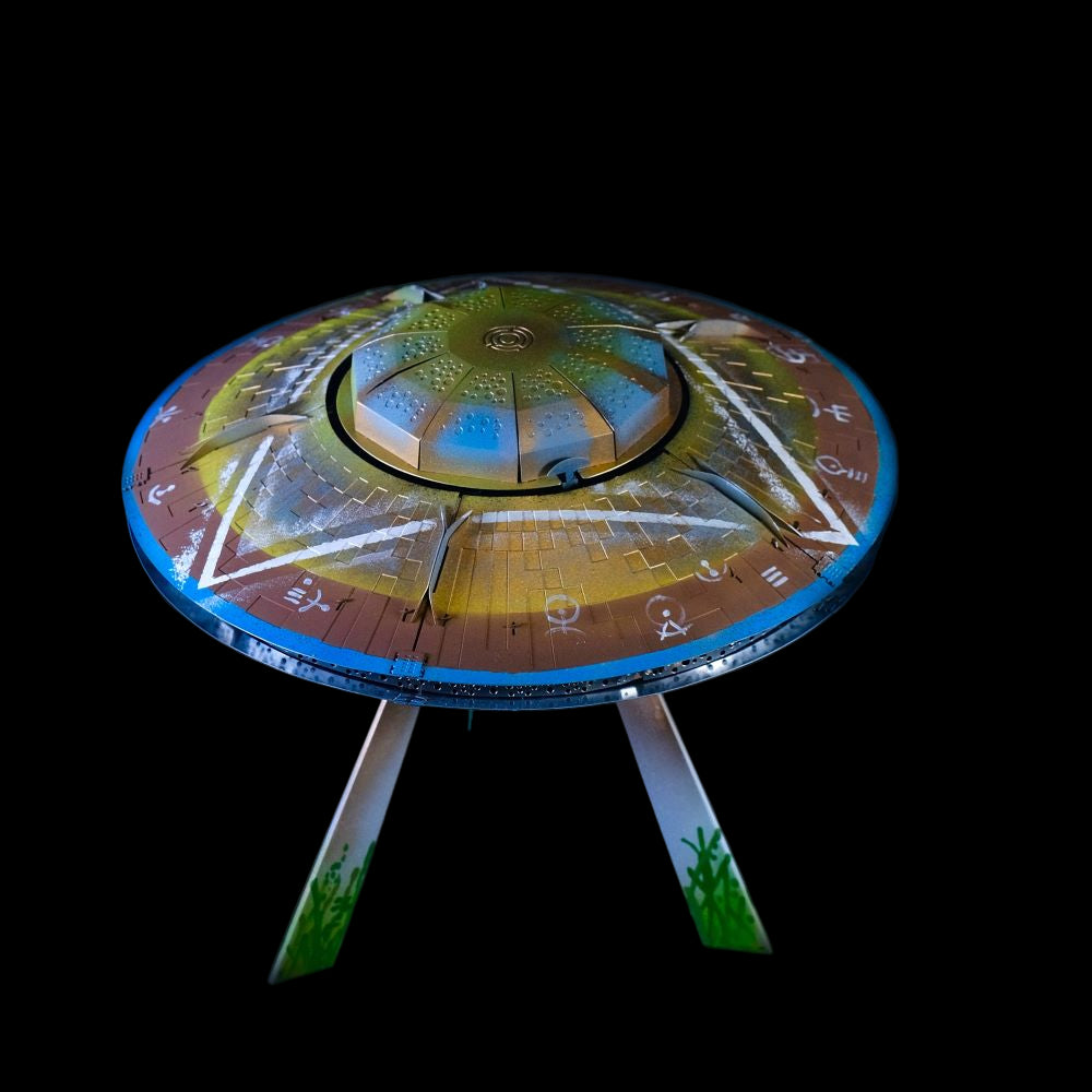 Decorative table with a celestial design on a black background