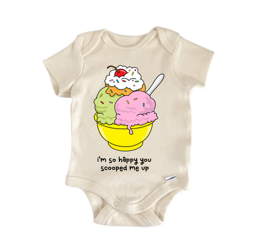 Beige baby onesie with ice cream graphic and text on a white background