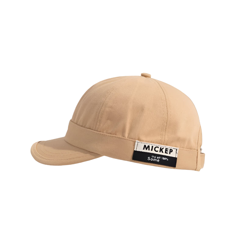 Beige cap with a patch on a white background