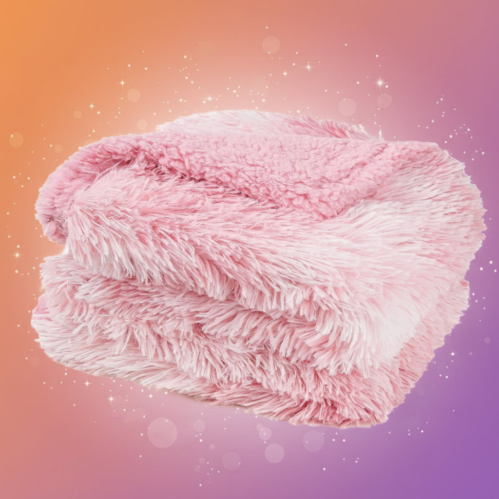Pink fluffy blanket on a white background