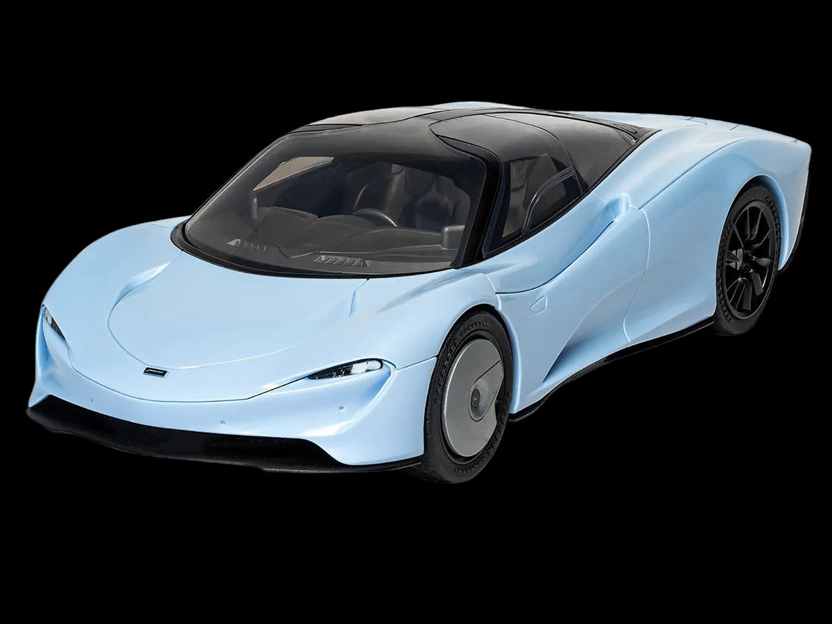 Light blue futuristic car model on a white background