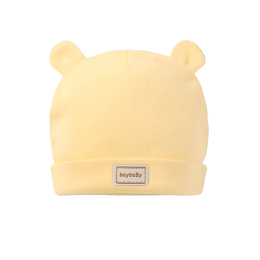 Yellow baby hat with bear ears and 'boyboBy' label on a white background