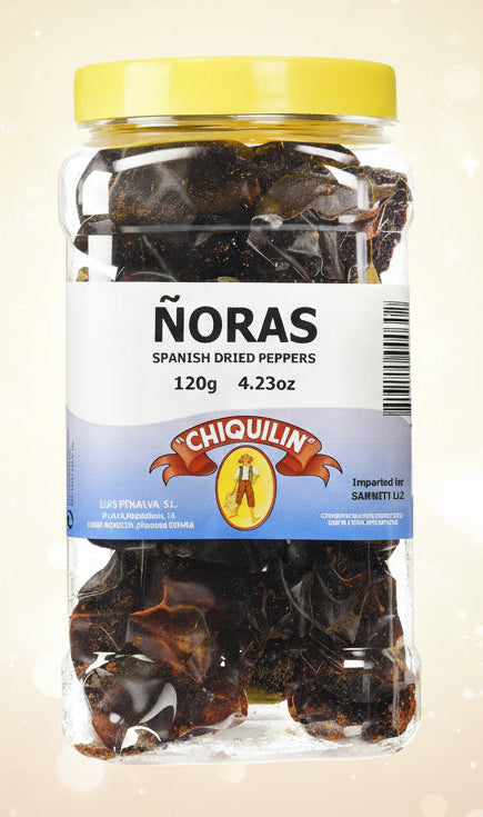 Jar of Spanish dried peppers with 'Chiquilin' label on a white background