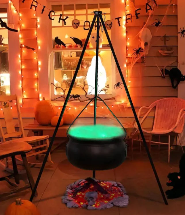 Halloween-themed room with glowing cauldron, pumpkins, and decorations.