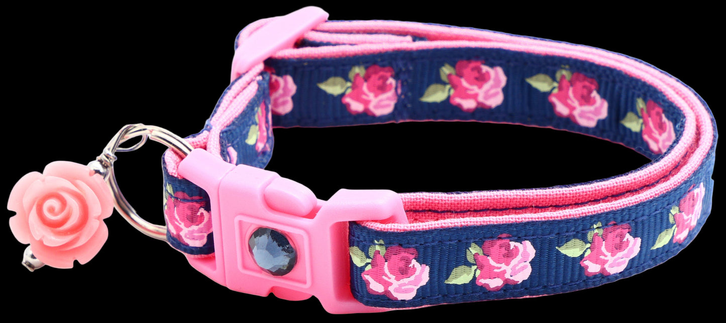 Dog collar with floral pattern and pink accents on a white background