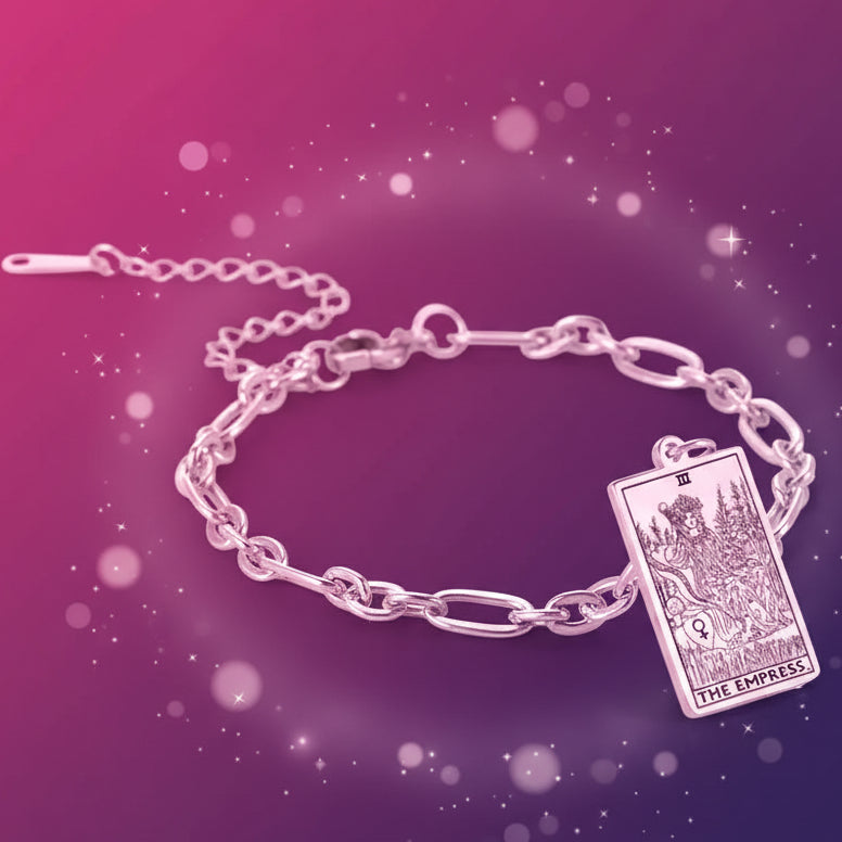 Silver chain bracelet with 'The Empress' tarot card pendant on a white background
