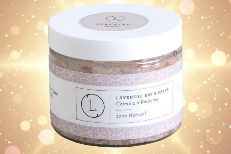 Jar of lavender bath salt with a white label on a light background