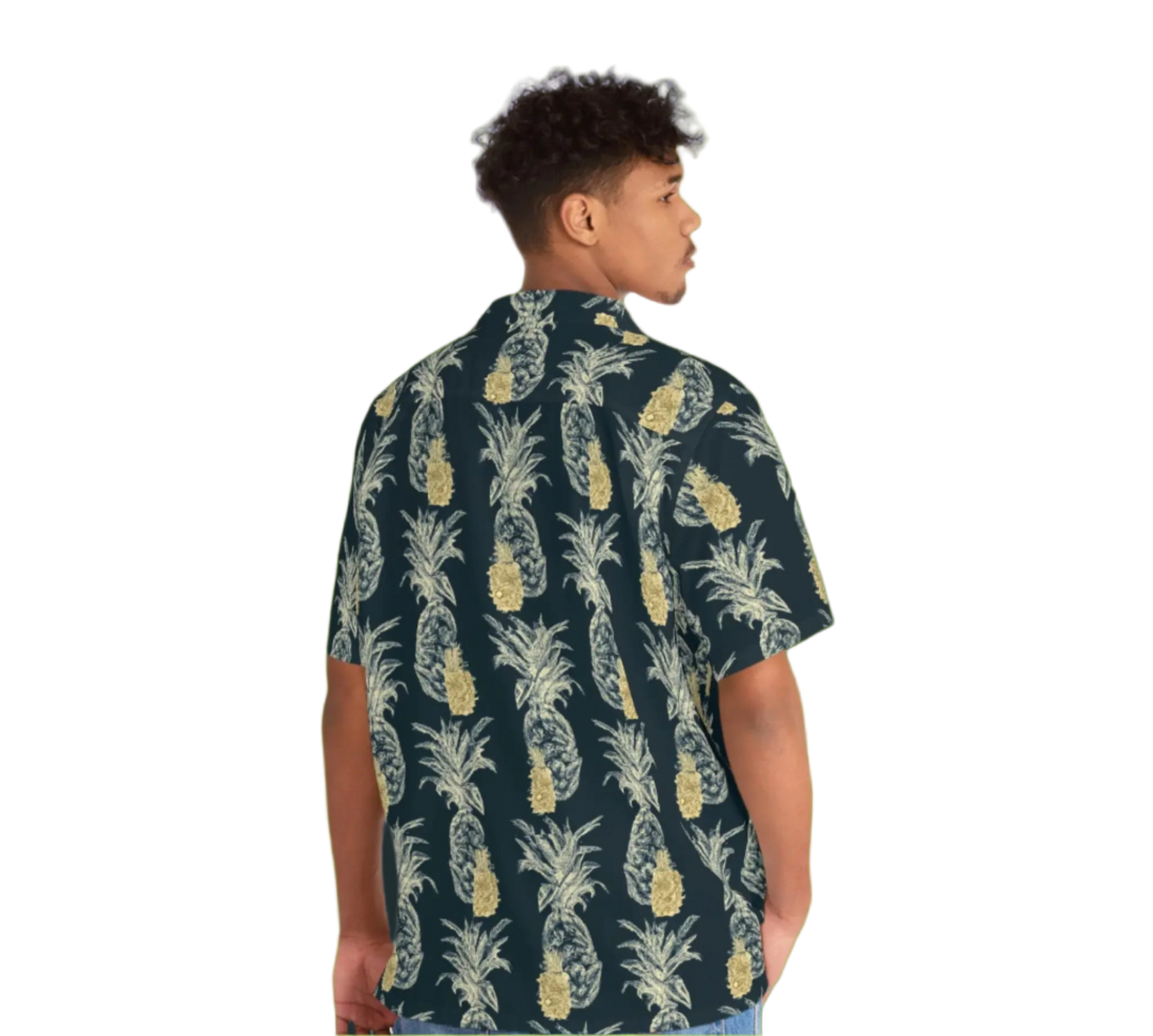 Person wearing a pineapple patterned shirt on a white background
