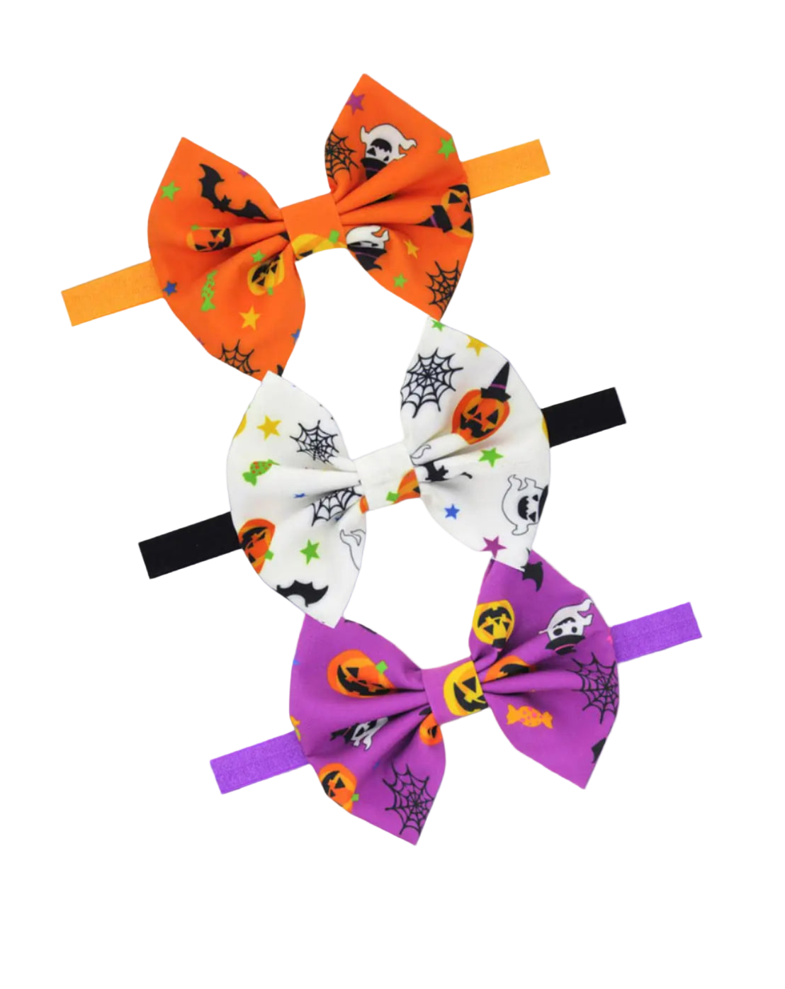 Set of three Halloween-themed hair bows on white background