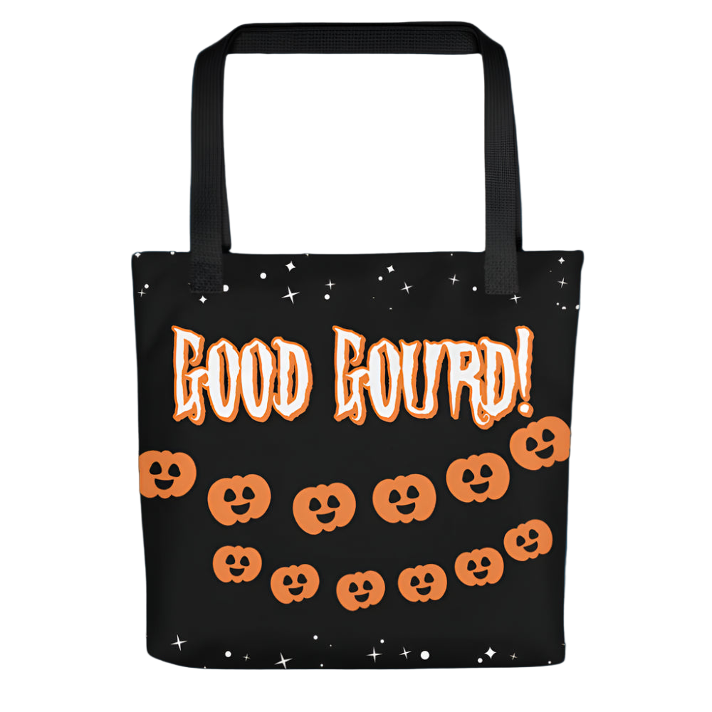Black tote bag with orange text and pumpkin designs on a white background