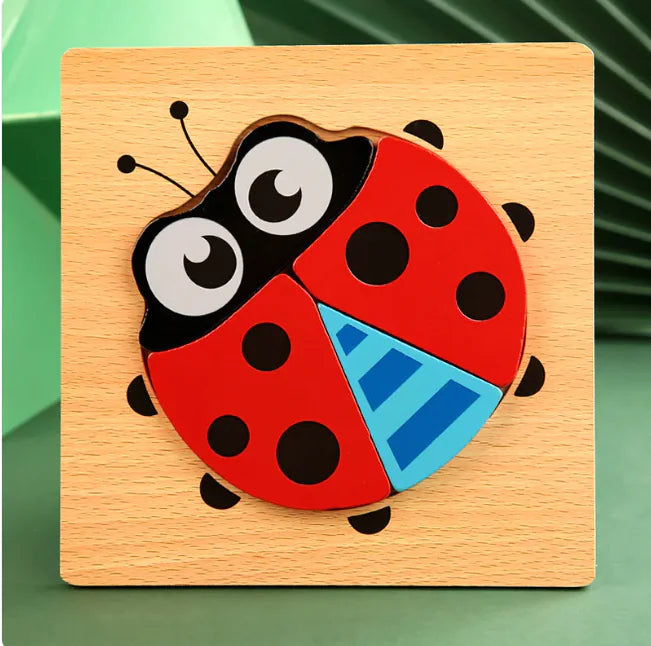 Wooden ladybug puzzle on a wooden base with a green background