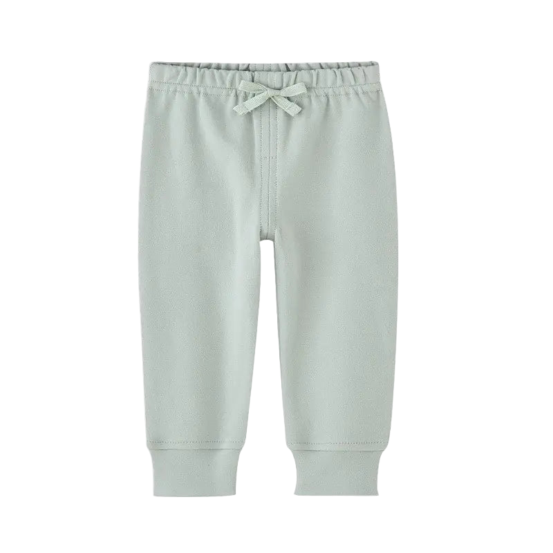 Light gray sweatpants with a drawstring on a white background