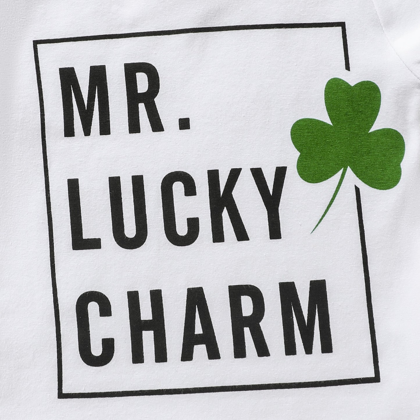 Text 'MR. LUCKY CHARM' with a green four-leaf clover on a white background
