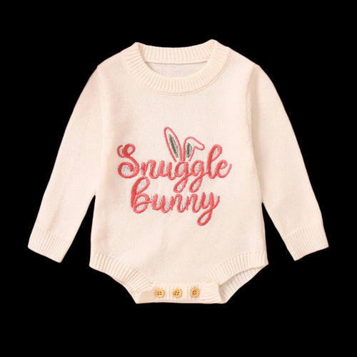 Baby sweater with 'Snuggle Bunny' text on a white background