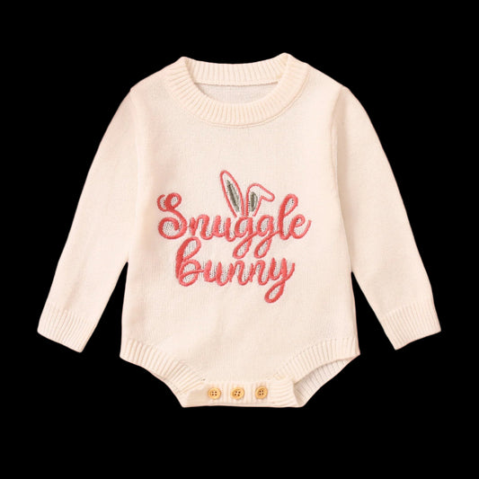 Baby sweater with 'Snuggle Bunny' text on a white background