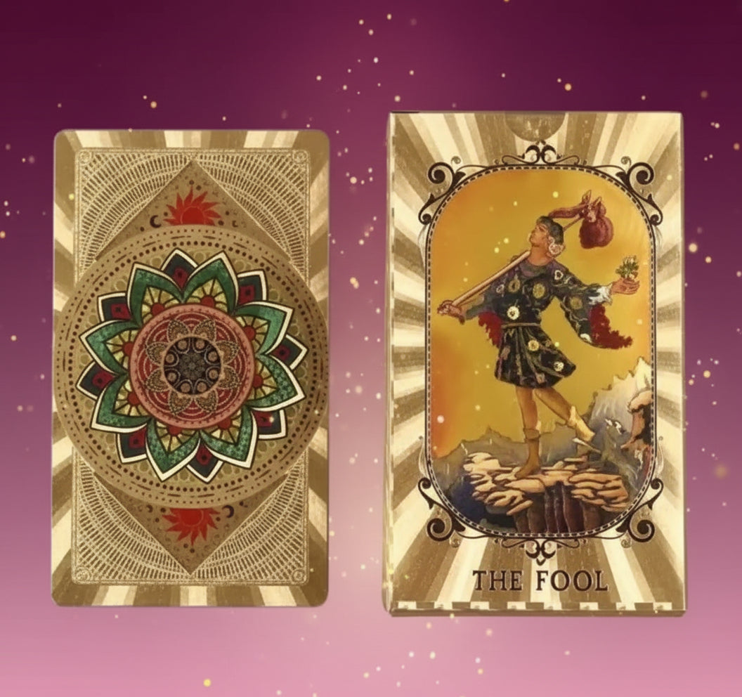Two tarot cards, one with a decorative design and 'The Fool' card on a gray background