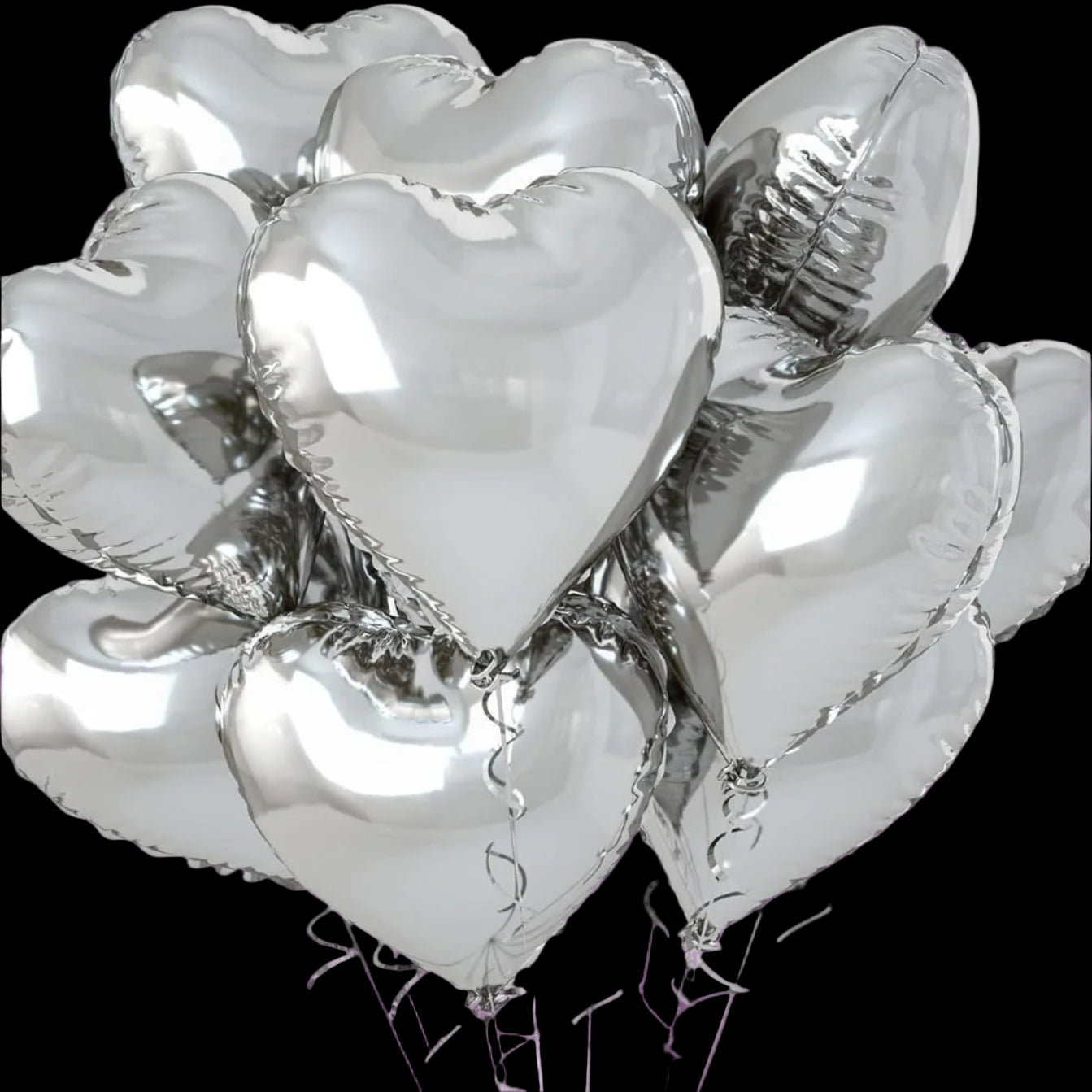 Silver heart-shaped balloons on a white background