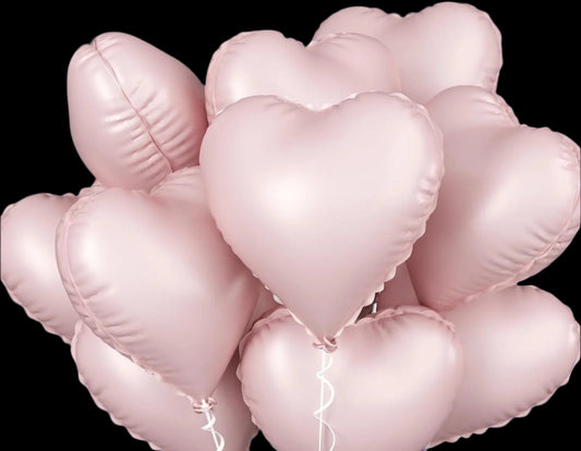 Pink heart-shaped balloons on a white background