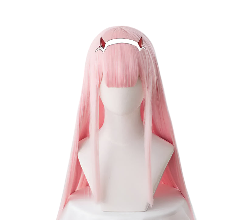 Pink wig with red hair clips on a mannequin head against a white background