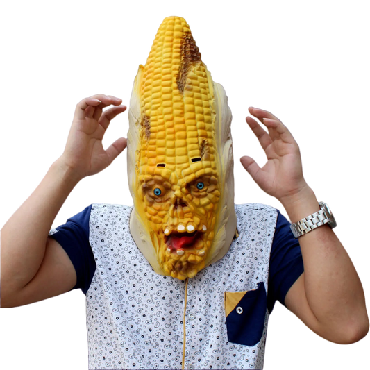Person wearing a corn mask with a face design on a white background